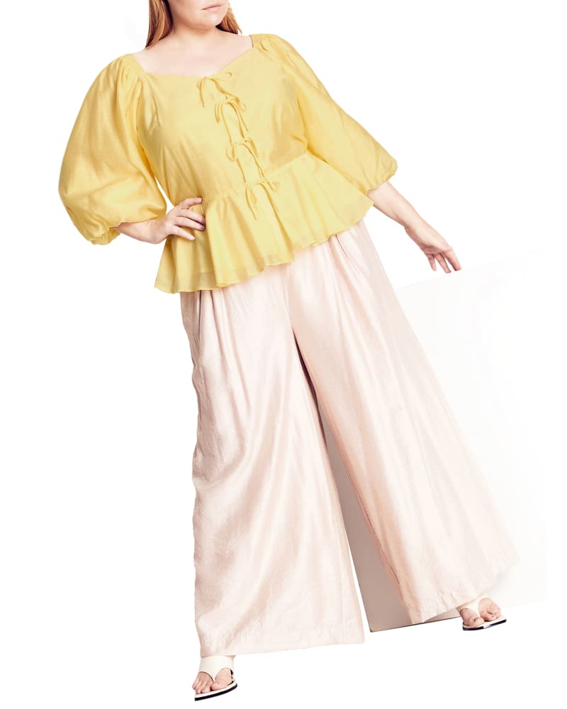 Front of a model wearing a size L TOP FIRST IMPRESSION in Limoncello by Refinity. | dia_product_style_image_id:288096